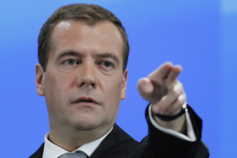 Russian President Dmitry Medvedev gestures during a news conference at a business school in Skolkovo outside Moscow, Russia, Wednesday, May 18, 2011. President Dmitry Medvedev said Wednesday that he believes that Russia could modernize faster than his powerful predecessor Vladimir Putin thinks, but he remained coy about whether he plans to seek a second term.(AP Photo/RIA Novosti, Dmitry Astakhov, Presidential Press Service)
