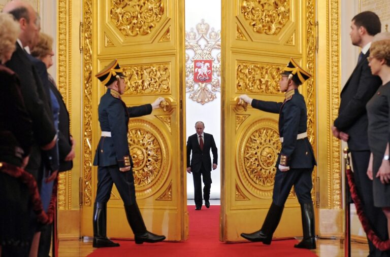 epa03209832 Honor guards open doors for arriving President-elect Vladimir Putin for his inauguration in the Grand Kremlin Palace in Moscow, Russia, 07 May 2012. Vladimir Putin took the oath of office for a third term as Russia's President, saying he considers 'service to the fatherland and our nation to be the meaning of my life'. EPA/ALEXEY DRUGINYN / RIA NOVOSTI / GOVERNMENT PRESS SERVICE POOL