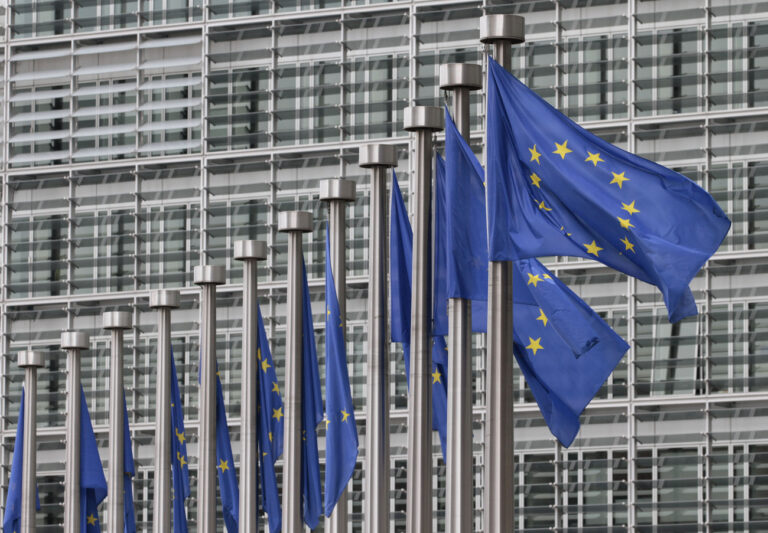 In this Monday, May 9, 2011 photo, EU flags fly at the European Commission headquarters in Brussels. . The European Union has won the Nobel Peace Prize, it has been announced on Friday, Oct. 12, 2012. (AP Photo/Yves Logghe)