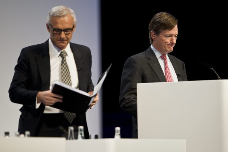 Urs Rohner, left, Chairman of the Board of Directors of Swiss Bank Credit Suisse, speaks next to Brady W. Dougan, CEO of Swiss Bank Credit Suisse (CS), during the general assembly of the Credit Suisse at the Hallenstadion in Zurich, Switzerland, on Friday, April 26 2013. (KEYSTONE/Ennio Leanza)