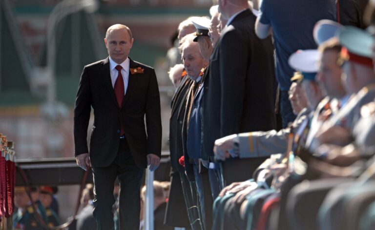 epa04197573 Russian President Vladimir Putin arrives to attend a military parade marking the 69th anniversary of the victory over Nazi Germany in the WWII in the Red Square in Moscow, Russia 09 May 2014. There are reports, unconfirmed, that Putin may travel to Sevastopol later in the day to attend a parade in the Crimean port. EPA/ALEXEY NIKOLSKY MANDATORY CREDIT