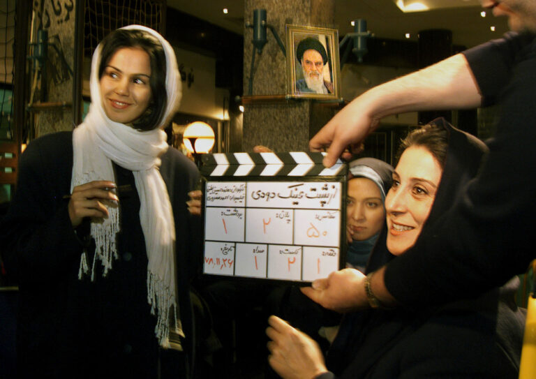ADVANCE FOR MONDAY, MARCH 20--ONE OF EIGHT PHOTOS BY ENRIC MARTI--Iranian movie star Ftemeh Motamed Aria, right, is shown with other actors during the shooting of her latest movie 