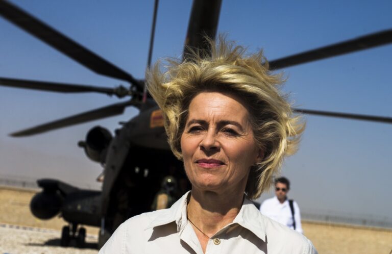 German Defence Minister Ursula von der Leyen leaves a helicopter during her visit at Camp Shaheen outside Mazar-i-Sharif, Afghanistan, Wednesday, July 23, 2014. (AP Photo/Thomas Peter, Pool)