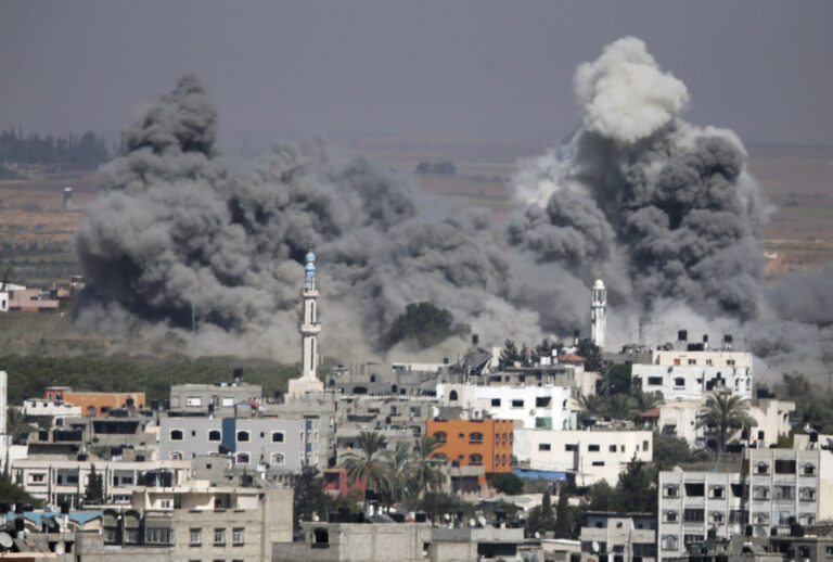 Smoke rises after an Israeli strike in Gaza City, northern Gaza Strip, Thursday, July 31, 2014. (AP Photo/Majed Hamdan)