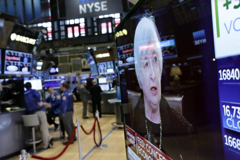 Federal Reserve Chair Janet Yellen's news conference is shown on a television screen, on the floor of the New York Stock Exchange, Thursday, Sept. 17, 2015. The Federal Reserve is keeping U.S. interest rates at record lows in the face of threats from a weak global economy, persistently low inflation and unstable financial markets. (AP Photo/Richard Drew)