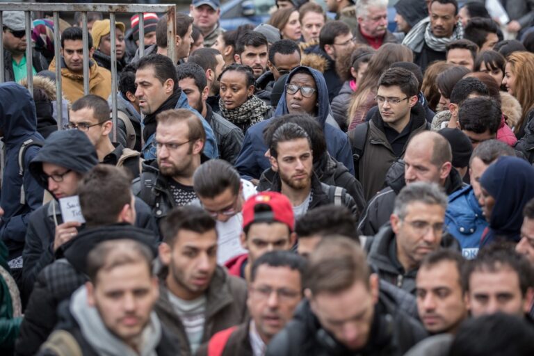 epa05187276 Job seekers gather at the job fair for refugees in Berlin, Germany, 29 February 2016. Several thousand of refugees came to get information on job and training offers of about 200 companies and educational institutions. EPA/MICHAEL KAPPELER