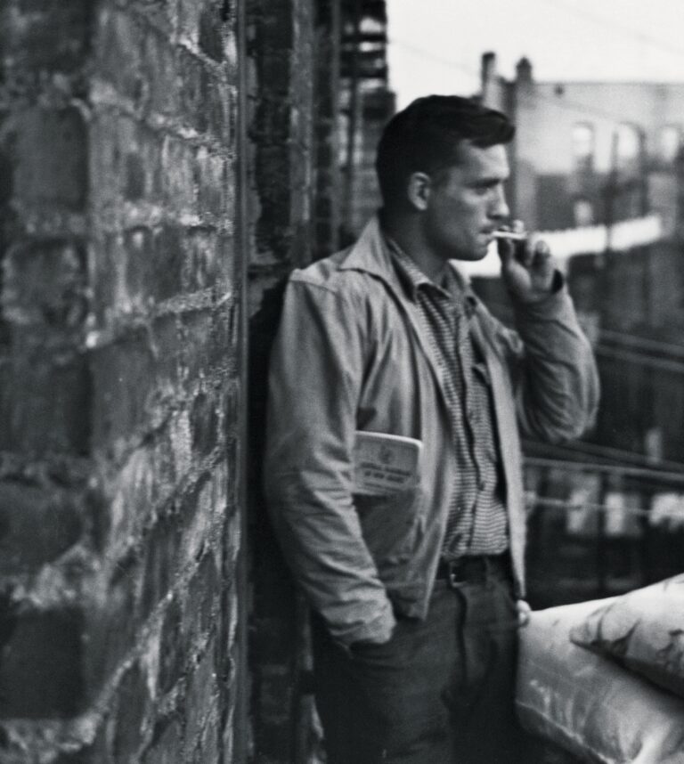 Jack Kerouac Smoking Cigarette in Fire Escape