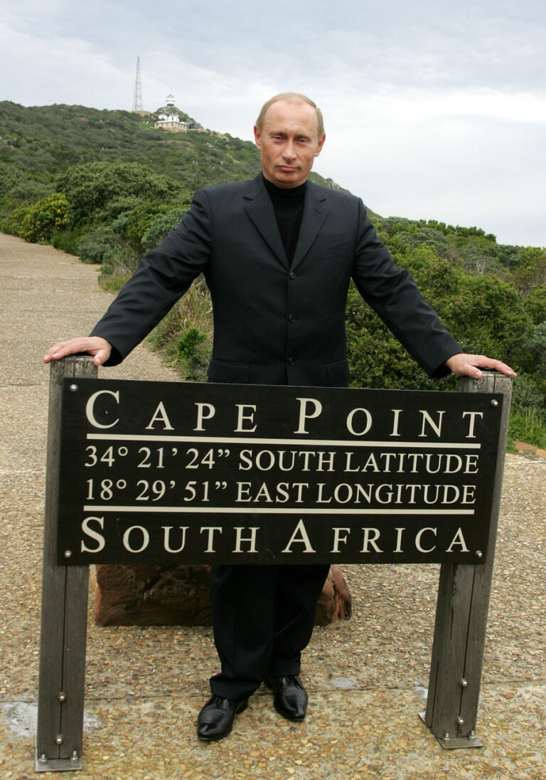 Russian President Vladimir Putin poses for a photograph at Cape Point, the most southern point of Africa, in Cape Town, South Africa, Wednesday, Sep. 6, 2006. Putin is the first Russian President to visit South Africa. (AP Photo/Obed Zilwa)