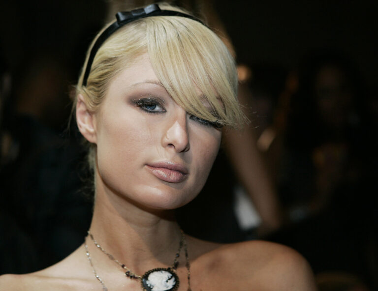 Paris Hilton attends the Luca Luca spring 2007 fashion show in New York, Monday, Sept. 11, 2006. (AP Photo/Jeff Christensen)
