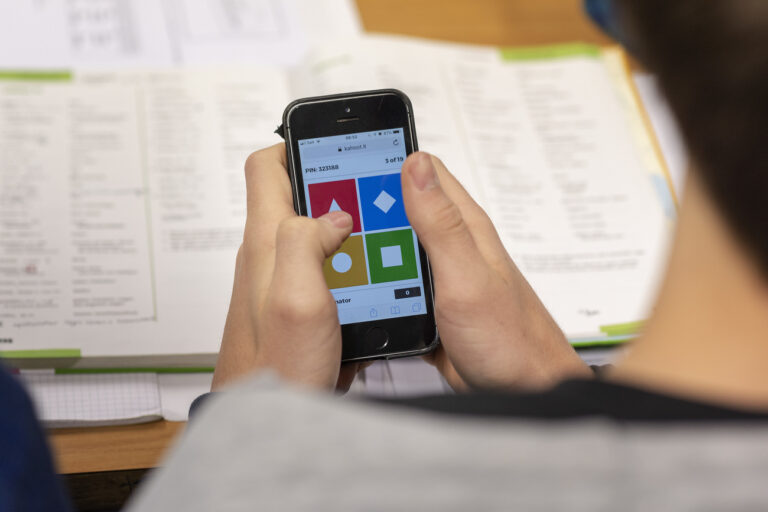 A pupil of the second grade class P16g solves a quiz on a smartphone during a Latin elective course lesson with teacher David Krebs (not in the picture) at the gymnasium of the Cantonal School Solothurn, Switzerland, on May 14, 2018. The Cantonal School Solothurn consists of a gymnasium, a specialized upper secondary school (Fachmittelschule FMS) and a secondary school (Sekundarschule P), which prepares the pupils for the gymnasium. (KEYSTONE/Christian Beutler)