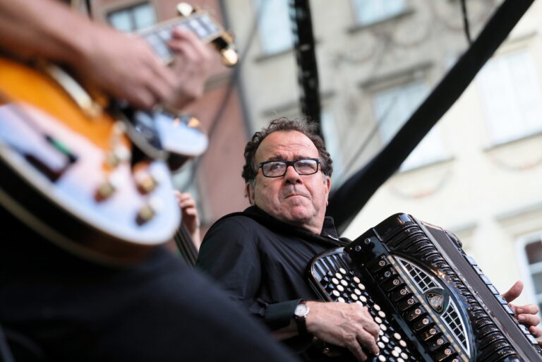 epa06943782 French multi-instrumentalist, accordion virtuoso, bandoneon and composer Richard Galliano performs at the Old Town Market Square in Warsaw, Poland, 11 August 2018 as part of the ongoing International Open Jazz Festival in the Old Town. EPA/Pawel Supernak POLAND OUT