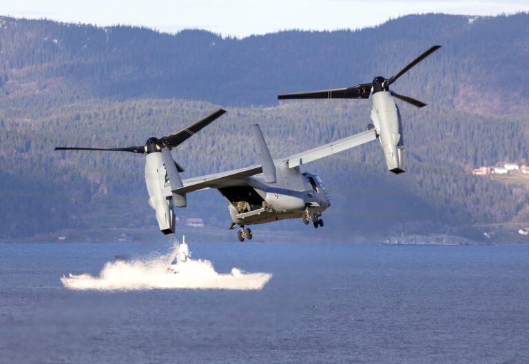 epa07131248 NATO Troops in landing craft with a USMC Osprey V-22 aircraft during the NATO-led military exercise Trident Juncture (TRJE18) on 'Distinguised Visitors Day,' in Trondheim, Norway, 30 October 2018. According to reports, some 50,000 participants from over 30 nations are expected to take part in the NATO-led military exercise in Norway from 25 October to 23 November 2018. EPA/Gorm Kallestad NORWAY OUT