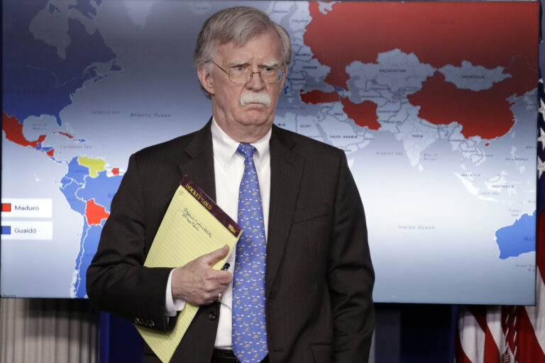 National security adviser John Bolton listens during a press briefing at the White House, Monday, Jan. 28, 2019, in Washington. (AP Photo/ Evan Vucci)