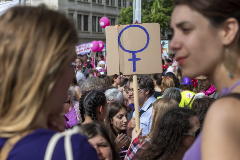 Women protest during a nationwide women's strike in Geneva, Switzerland, 14 June 2019. The strike day intends to highlight, among others, unequal wages, pressures on part-time employees, the burden of household work and sexual violence. (KEYSTONE/Martial Trezzini)