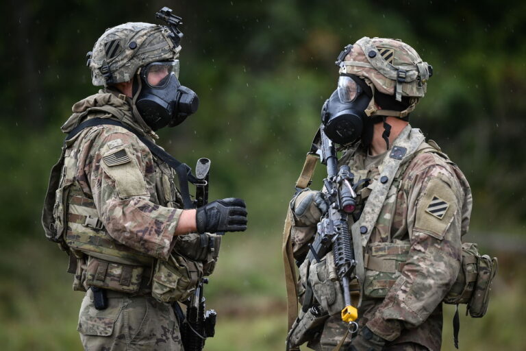 epa08697411 A US soldier wear gas masks during a simulated chemical attack in the military exercise ‚Combined Resolve XIV'at the US Army's Joint Multinational Readiness Center in Hohenfels, Germany, 25 September 2020. In the military exercise, forces from the United States, France, Italy, Lithuania, North Macedonia, Poland, Romania, Slovenia and Ukraine train their joint operational capabilties. EPA/PHILIPP GUELLAND