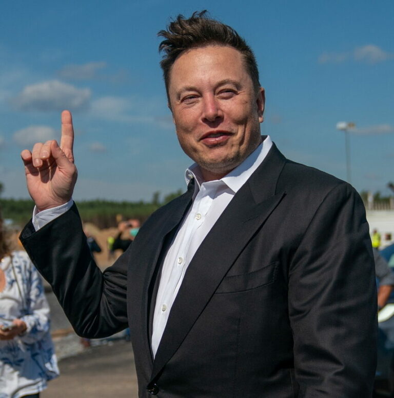 epa08774406 YEARENDER 2020 .ECONOMY BUSINESS FINANCE..Tesla and SpaceX CEO Elon Musk (R) gives a statement at the construction site of the Tesla Giga Factory in Gruenheide near Berlin, Germany, 03 September 2020. Musk visited the German medical company Curevac in Tuebingen on 01 September 2020. Media report Musk will meet the German Economy Minister for talks. In June 2020, the German state invested 300 million euros in the vaccine developer Curevac and received 23 percent of the company's shares in return. EPA/ALEXANDER BECHER *** Local Caption *** 56315718