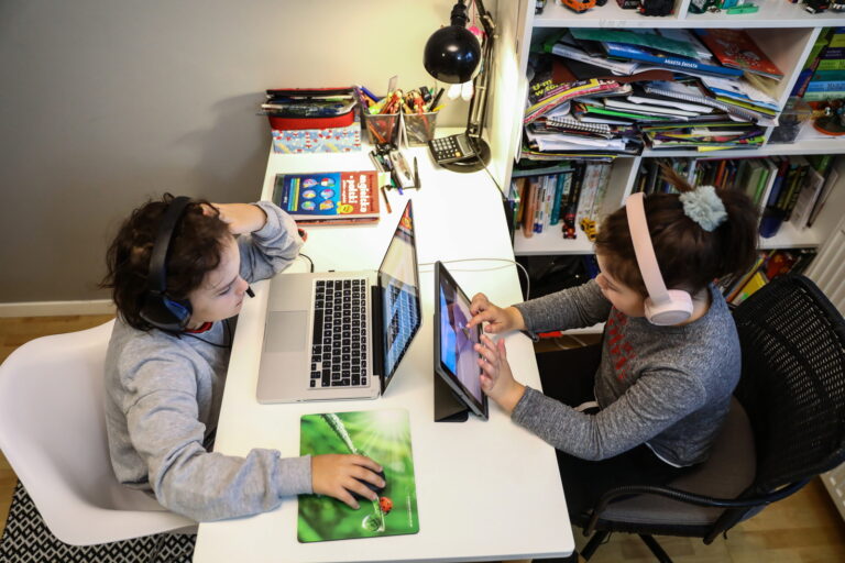 epa08809154 Children of a primary school study online from home in Warsaw, Poland, 09 November 2020, amid the ongoing pandemic of the COVID-19 disease caused by the SARS-CoV-2 coronavirus. Poland's new restrictions in retail, entertainment, schooling and hotels took effect as of 07 November and will remain in place until at least November 29. Remote schooling is mandatory for all grades of elementary school and above. EPA/Rafal Guz POLAND OUT