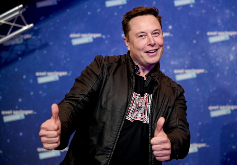 epa08855477 SpaceX owner and Tesla CEO Elon Musk poses after arriving on the red carpet for the Axel Springer award, in Berlin, Germany, 01 December 2020. EPA/BRITTA PEDERSEN / POOL
