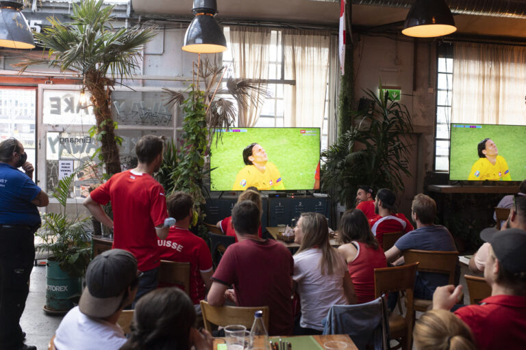 Swiss soccer fans react during the live broadcast of the UEFA EURO 2020 soccer match between Spain and Switzerland at the Amboss Rampe in Zurich, Switzerland, Friday, 2. July 2021. (KEYSTONE/Ennio Leanza).