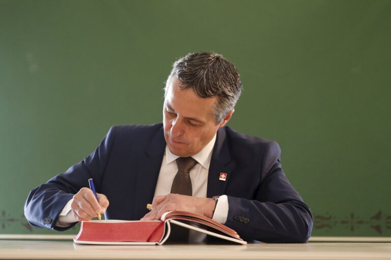 epa09323392 Vice-President of the Federal Council, Head of the Federal Department of Foreign Affairs of the Swiss Confederation, Ignazio Cassis signs guest book during his meeting with Latvian President in Riga, Latvia, 05 July 2021. Levits and Cassis discussed the latest international developments, the relations between the EU and Switzerland, as well as bilateral cooperation. Cassis is on an official visit to the Baltic states from 04 to 08 July. EPA/TOMS KALNINS