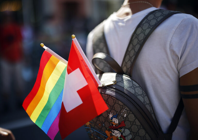 People demonstrate at the Zurich Pride parade in Zurich, Switzerland, with the slogan 