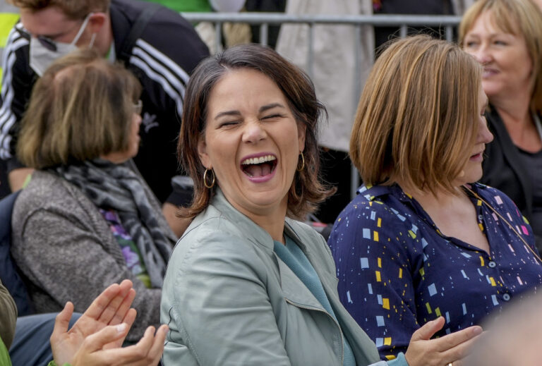 Top candidate for chancellor of the Greens Annalena Baerbock laughs during an election campaign in Mainz, Germany, Monday, Sept.20, 2021. German elections will be on Sept.26. (AP Photo/Michael Probst)
