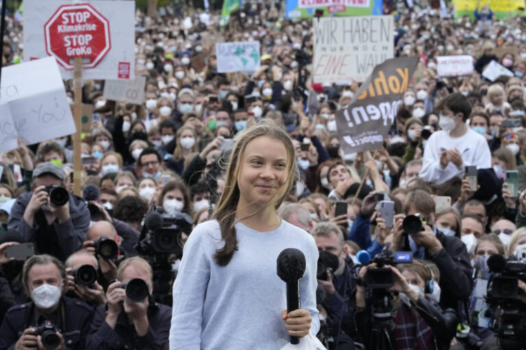 Swedish climate activist Greta Thunberg at a stage during a Fridays for Future global climate strike in Berlin, Germany, Friday, Sept. 24, 2021. (AP Photo/Markus Schreiber)