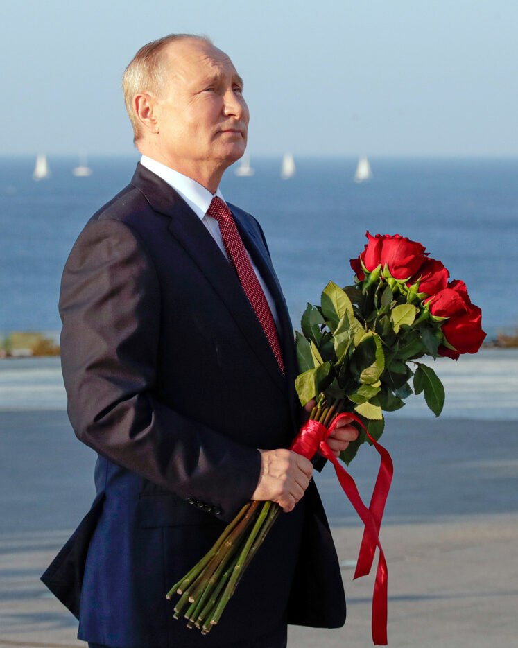 Russian President Vladimir Putin delivers attends a flower-laying ceremony at the memorial complex dedicated to the end of the Russian Civil War during marking Unity Day in Sevastopol, Crimea, Thursday, Nov. 4, 2021. (AP Photo/Mikhail Metzel)