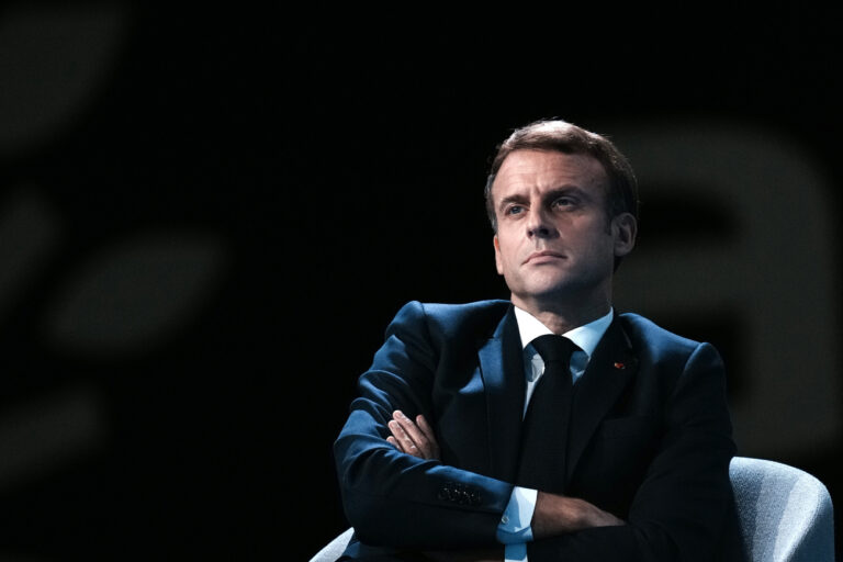 French President Emmanuel Macron attends the AMF congress, the annual meeting of French mayors in Paris, Thursday, Nov. 18, 2021. (AP Photo/Thibault Camus, Pool)