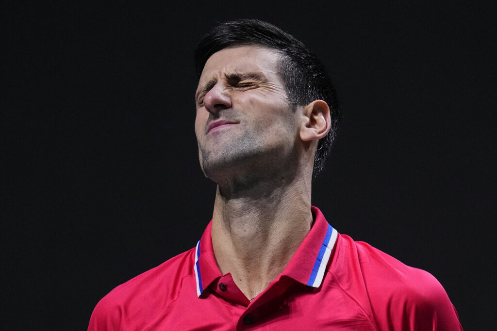 Serbia's Novak Djokovic reacts against Kazakhstan's Alexander Bublik during a Davis Cup quarter final match between Serbia and Kazakhstan at the Madrid Arena stadium in Madrid, Spain, Wednesday, Dec. 1, 2021. (AP Photo/Manu Fernandez)