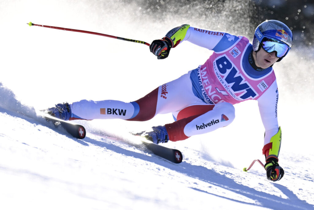 Marco Odermatt of Switzerland in action during the men's super-g race at the Alpine Skiing FIS Ski World Cup in Wengen, Switzerland, Thursday, January 13, 2022. (KEYSTONE/Jean-Christophe Bott)