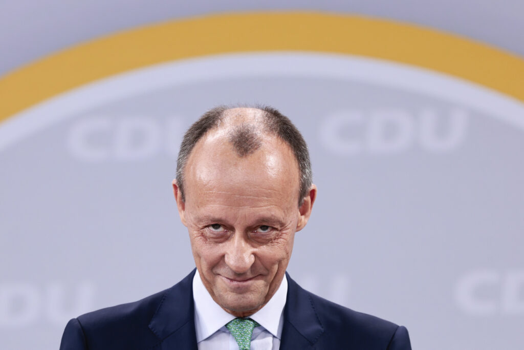 Christian Democratic Party (CDU) designated Chairman Friedrich Merz looks into the camera during a virtual party congress at the party headquarters, in Berlin, Germany, Saturday, January 22, 2022. (Hannibal Hanschke/Pool via AP)