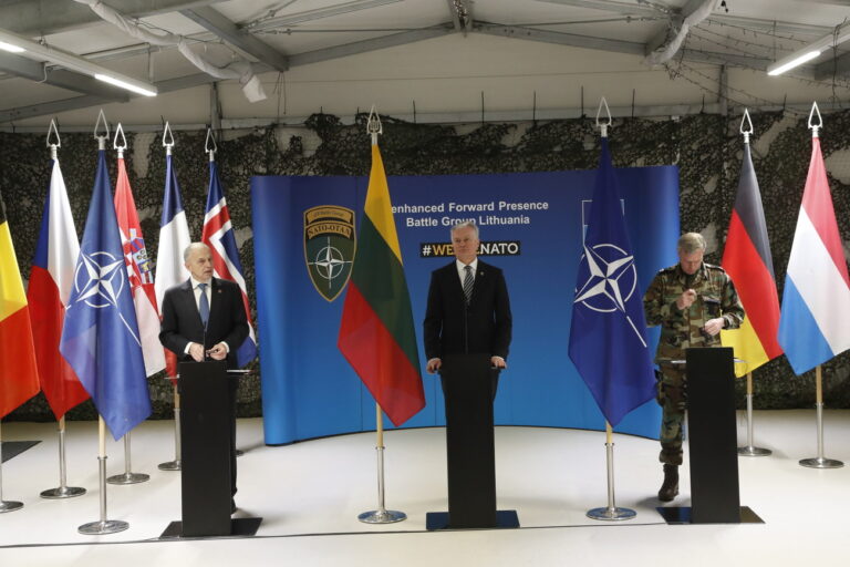 epa09741274 NATO Deputy Secretary General Mircea Geoana (L), Lithuanian President Gitanas Nauseda and Chairman of the NATO Military Committee Rob Bauer (R) attend press conference in Rukla Army Base, Lithuania, 09 February 2022. High-ranking Lithuaniaà”s, NATO officials, ministers and chiefs of defence of contributing nations participated in ceremony to mark the fifth anniversary of NATOà•s enhanced Forward Presence Battle Group in the eastern part of the Alliance. EPA/TOMS KALNINS