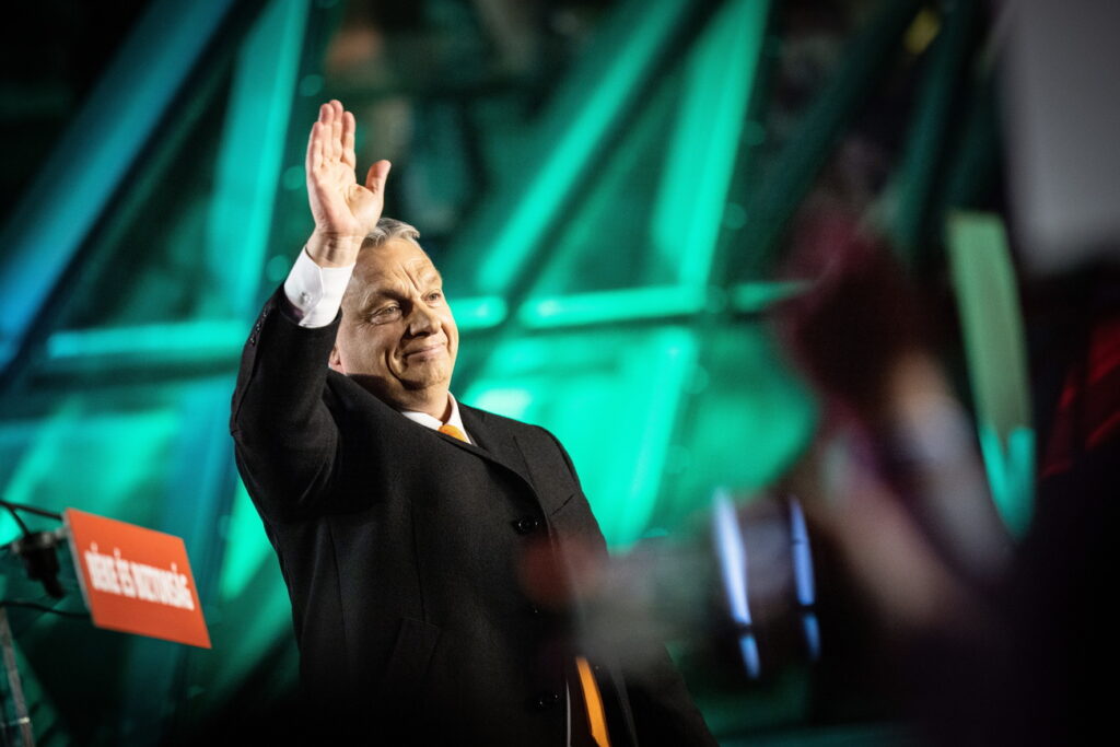 epa09868950 A handout photo made available by the Hungarian PM's Press Office shows Hungarian Prime Minister Viktor Orban waves to his supporters during the governing Fidesz-KDNP party's event after the general election and national referendum on the child protection law in Budapest, Hungary, 03 April 2022. EPA/ZOLTAN FISCHER / HUNGARIN PRIME MNISTER OFFICE / HANDOUT HANDOUT EDITORIAL USE ONLY/NO SALES