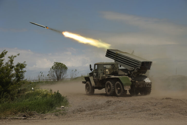 A Donetsk People's Republic militia's multiple rocket launcher fires from its position not far from Panteleimonivka, in territory under the government of the Donetsk People's Republic, eastern Ukraine, Saturday, May 28, 2022. (AP Photo/Alexei Alexandrov)