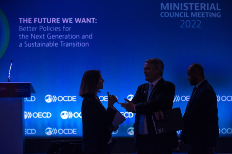epa10001750 Secretary-General of the Organization for Economic Co-operation and Development (OECD), Mathias Cormann (C) speaks with OECD chief economist Laurence Boone (L) prior to a press conference to present the OECD Economic Outlook ahead the OECD Ministerial Council meeting, in Paris, France, 08 June 2022. The OECD 2022 Ministerial Council Meeting will take place on 09-10 June. EPA/CHRISTOPHE PETIT TESSON