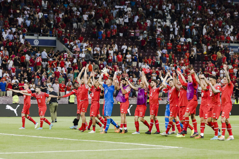Switzerland's players celebrates after their victory in the UEFA Nations League group A2 soccer match between Switzerland and Portugal at the Stade de Geneve stadium, in Geneva, Switzerland on Sunday, June 12, 2022. (KEYSTONE/Michael Buholzer)