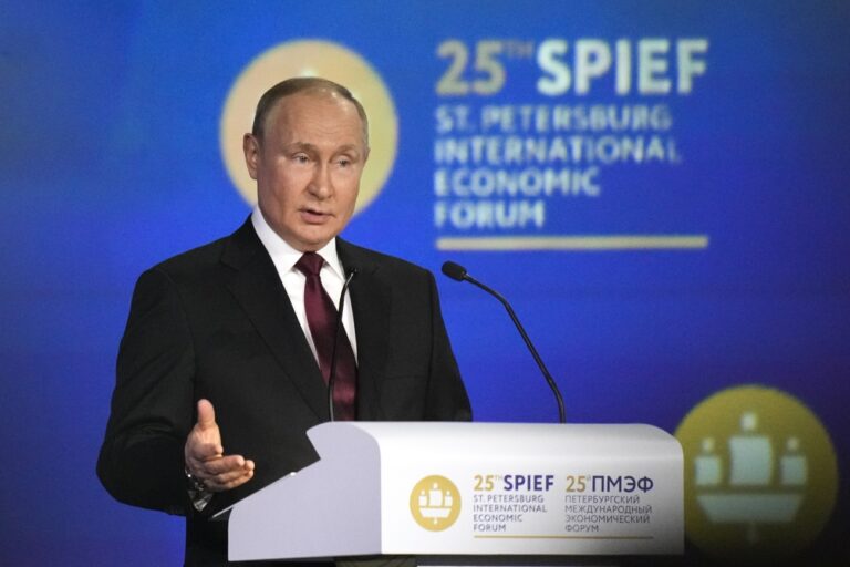 Russian President Vladimir Putin gestures as he addresses a plenary session of the St. Petersburg International Economic Forum in St.Petersburg, Russia, Friday, June 17, 2022. RussiaâÄ™s annual event to tout its investment opportunities this year was shadowed by the stern international sanctions imposed on the country after the Kremlin sent troops into Ukraine four months earlier and by the extensive disapproval of foreign businesses, which have suspended operations or pulled out entirely, leaving Russian shopping centers pocked with dark, shuttered stores. (AP Photo/Dmitri Lovetsky)