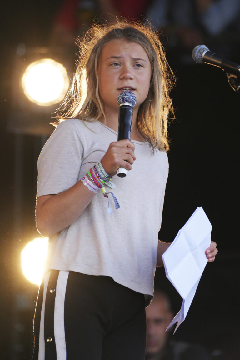 Greta Thunberg addresses the crowd at the Glastonbury Festival in Worthy Farm, Somerset, England, Saturday, June 25, 2022. (AP Photo/Scott Garfitt)