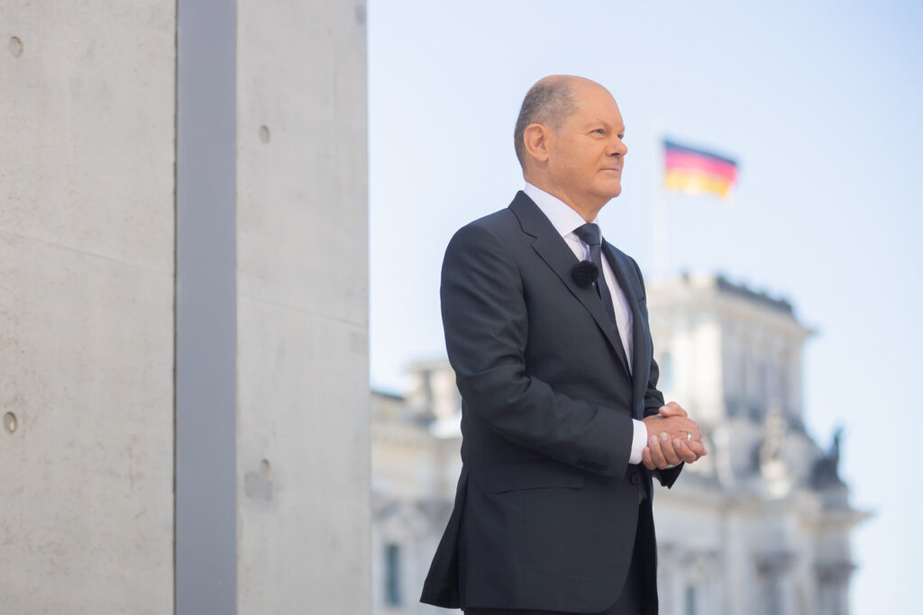 03 July 2022, Berlin: Chancellor Olaf Scholz (SPD) waits on the terrace of the Marie-Elisabeth-Lüders-Haus for the start of the summer interview of the ARD 