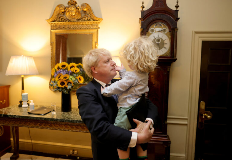07/07/2022. London, United Kingdom. Prime Minister Boris Johnson resignation. The Prime Minister Boris Johnson hugs his son Wilfred as he arrives back into No10 after delivering his statement in Downing street after resigning as the leader of the Conservative Party., Credit:Andrew Parsons / Avalon (KEYSTONE/PHOTOSHOT/Andrew Parsons / Avalon)