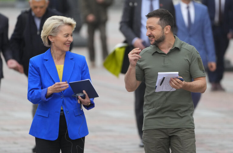 Ukrainian President Volodymyr Zelenskyy, right, and European Commission President Ursula von der Leyen smile during their meeting in Kyiv, Ukraine, Thursday, Sept. 15, 2022. (AP Photo/Efrem Lukatsky)