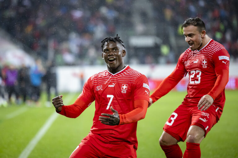 Switzerland's Breel Embolo, left, celebrates with Xherdan Shaqiri, right, after scoring the second goal for Switzerland during the UEFA Nations League group A2 soccer match between Switzerland and Czech Republic, on Tuesday, September 27, 2022, at the Kybunpark stadium, in St. Gallen, Switzerland. (KEYSTONE/Michael Buholzer)