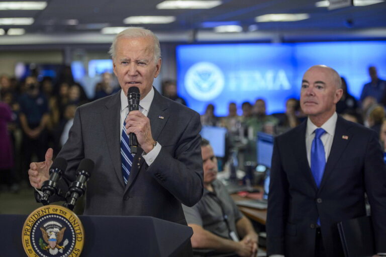 epa10214194 US President Joe Biden (L) speaks as Secretary of the Department of Homeland Security Alejandro Mayorkas (R) looks on during a press conference after being briefed on the impact of Hurricane Ian and ongoing federal government response efforts at FEMA Headquarters, in Washington, DC, USA, 29 September 2022. EPA/BONNIE CASH / POOL