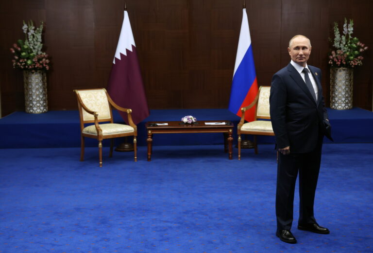 epa10240264 Russian President Vladimir Putin stands before a meeting with Emir of Qatar Sheikh Tamim Bin Hamad Al-Thani (not pictured), on the sidelines of the 6th Summit of the Conference on Interaction and Confidence Building Measures in Asia (CICA) in Astana, Kazakhstan, 13 October 2022. EPA/VYACHESLAV PROKOFIYEV / KREMLIN / SPUTNIK POOL MANDATORY CREDIT