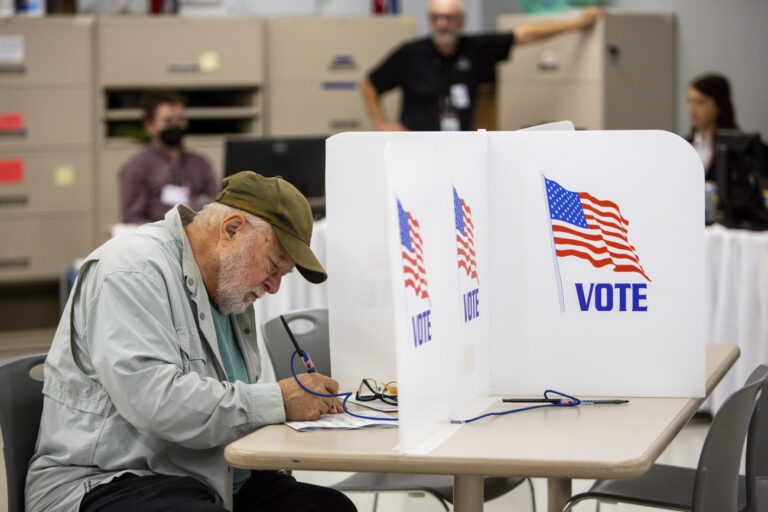 FILE - Voters cast their ballots on Sept. 23, 2022, in Minneapolis. The upcoming midterm elections could give the stock market a sorely needed boost by eliminating at least some of the uncertainty that's clouding the way for investors. (AP Photo/Nicole Neri, File)