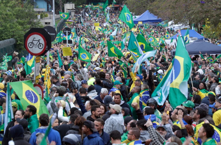 epa10281879 Supporters of Brazil's outgoing President Jair Bolsonaro protest against the election results, outside the Brazilian Army barracks in Sao Paulo, Brazil, 2 November 2022. Thousands of people have gathered in front of the gates of barracks in Sao Paulo, Brasilia and Rio de Janeiro to demand a 'military intervention' against the electoral victory of progressive leader Luiz Inacio Lula da Silva. The rallies were organized through social networks by far-right groups that support Bolsonaro and do not recognize Lula's democratic election. EPA/Fernando Bizerra