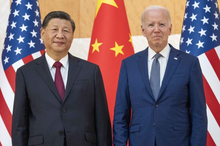 U.S. President Joe Biden, right, stands with Chinese President Xi Jinping before a meeting on the sidelines of the G20 summit meeting, Monday, Nov. 14, 2022, in Bali, Indonesia. President Biden and other leaders of the Group of 20 leading economies will meet in Bali, a tropical island in Indonesia, this week. The gathering is the first G-20 summit since before the pandemic to include face-to-face talks between the leaders. (AP Photo/Alex Brandon)