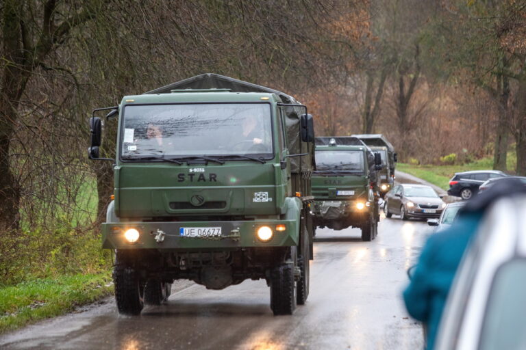 epa10308406 Military vehicles during operational activities in Przewodow, Lublin Voivodeship, Poland, 16 November 2022. Poland has raised military readiness after a missile explosion killed two civilians in Przewodow, a Polish village near the border with Ukraine, November 15. 'The missile which fell on Polish territory was probably a 1970s Russian product. We have no proof of its being fired from Russia. It is highly probable that it belonged to the Ukrainian defence forces,' President Andrzej Duda said in a statement on 16 November. EPA/WOJTEK JARGILO POLAND OUT
