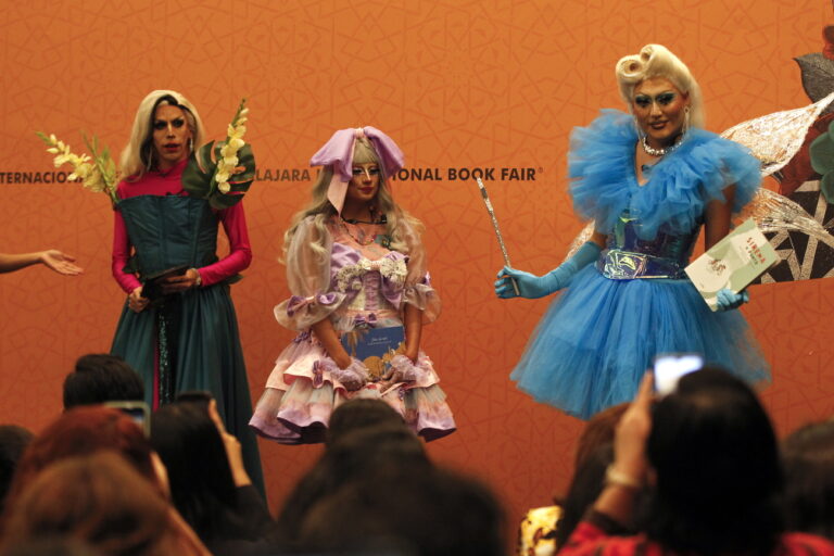 epa10346890 Members of the Drag Queen Story Hour Collective participate in the reading of inclusive stories, during the 36th edition of the International Book Fair (FIL) in Guadalajara, Jalisco, Mexico, 02 December 2022 (issued 03 December 2022). EPA/Francisco Guasco